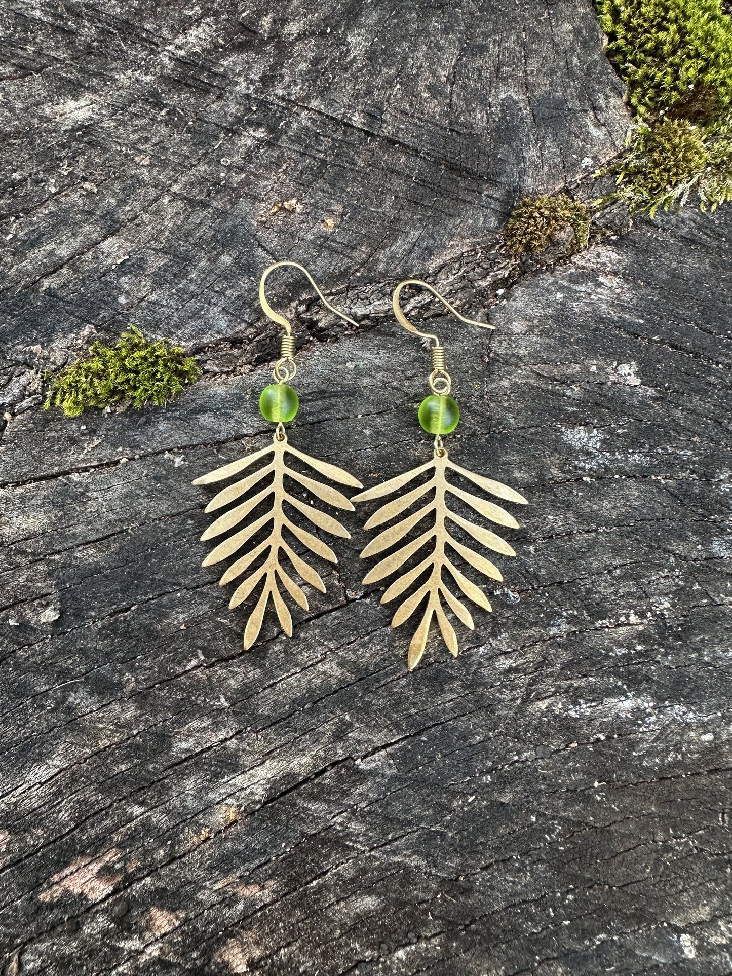 Fern dangle earrings with green sea glass made with sturdy brass, gold color,