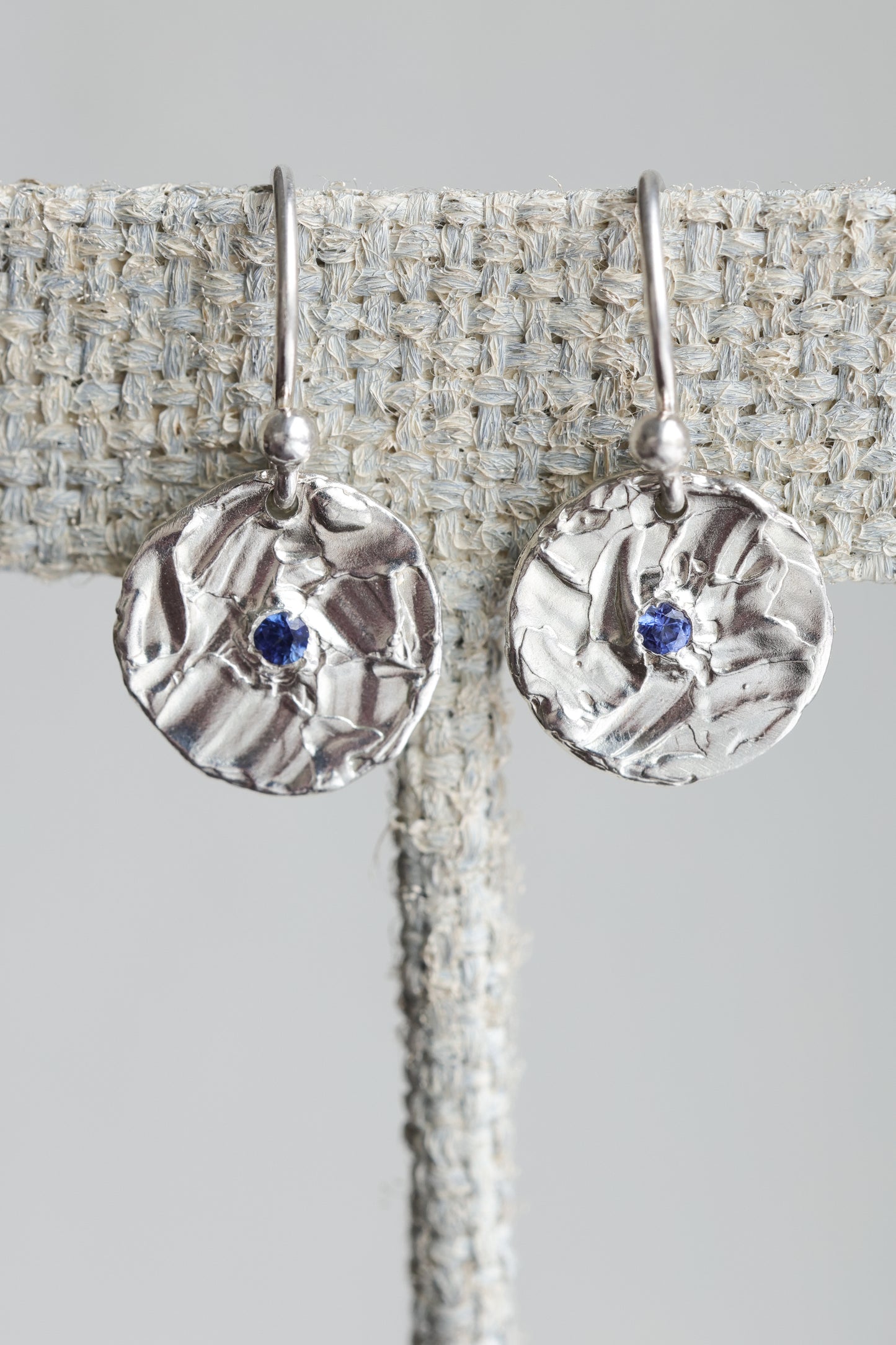 Small one of a kind blue sapphire earrings textured