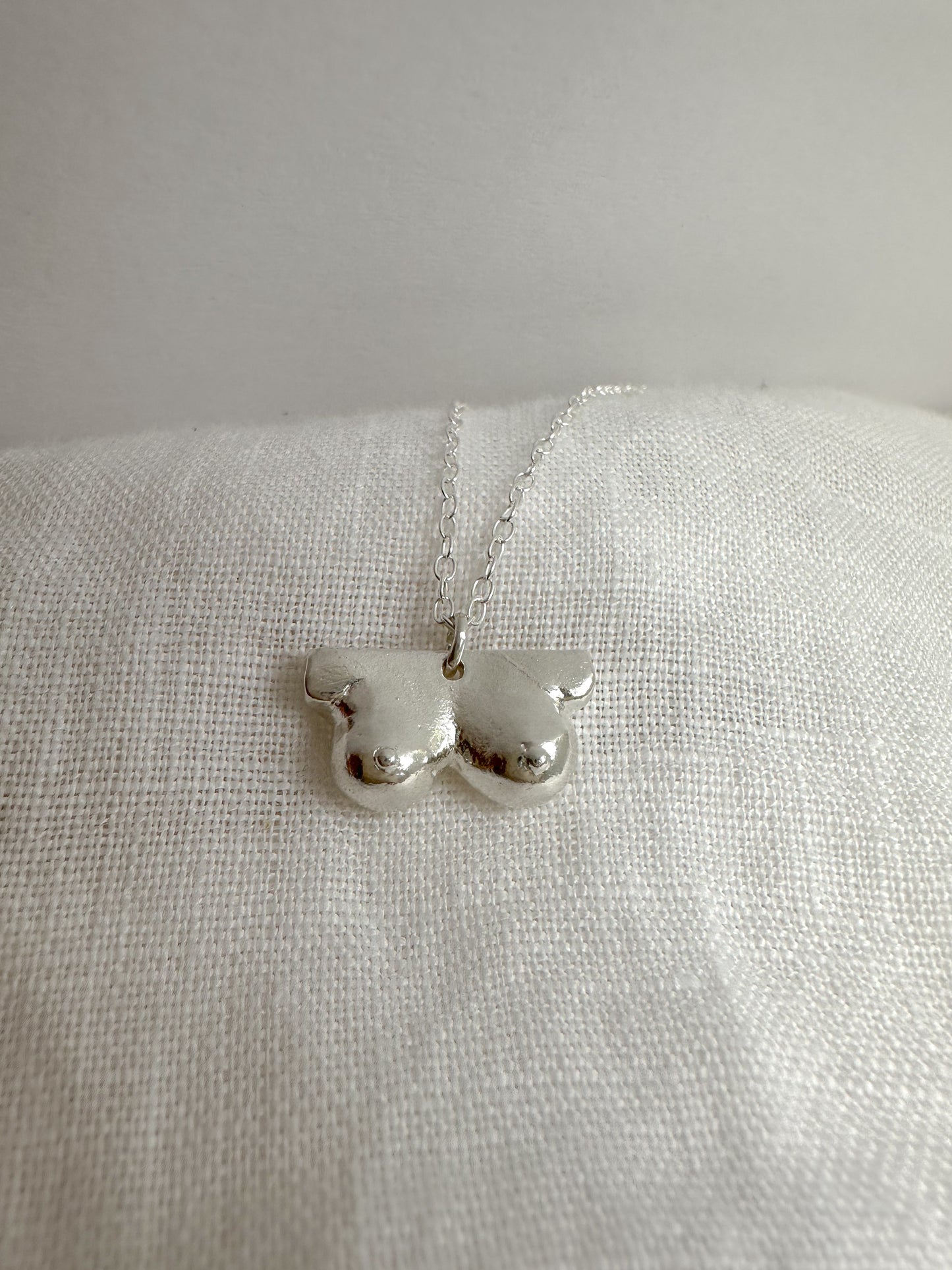 Boob necklace sterling silver breast necklace, hand-carved in Maine, adjustable chain, free shipping